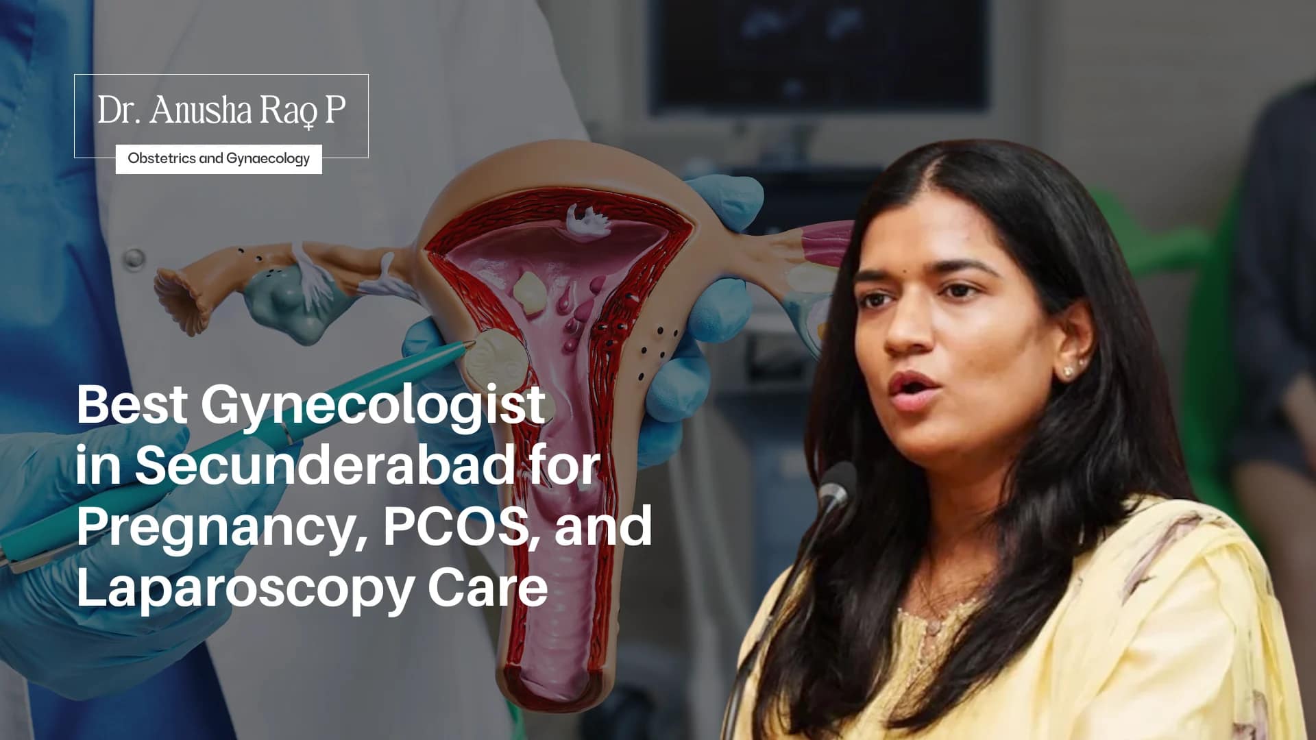 A gynecologist holding a medical model of the female reproductive system while another female doctor speaks at a microphone, representing expert care for pregnancy, PCOS, and laparoscopy in Secunderabad.